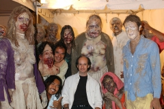 Movement coach Lorin Eric Salm poses with zombie actors on location for the feature film All Souls Day