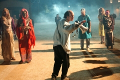 Movement coach Lorin Eric Salm giving direction to zombie actors on set of the feature film All Souls Day